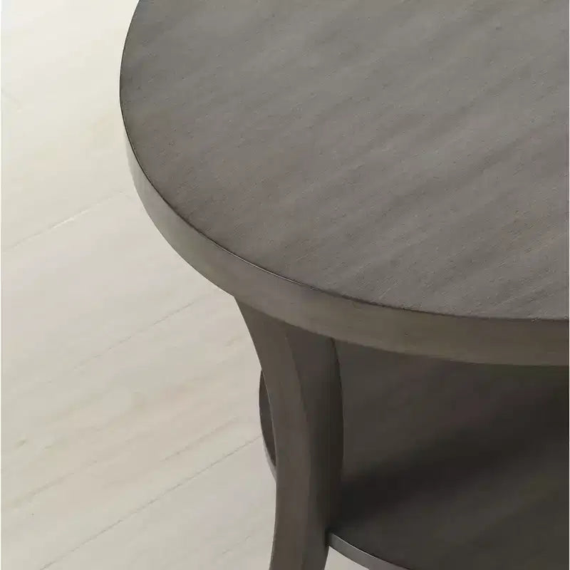 Tavolino rotondo grigio con ripiano inferiore, montaggio per 1 persona